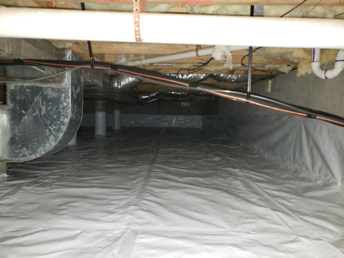 After full encapsulation project - everything in covered in a white tarp and a air vent 